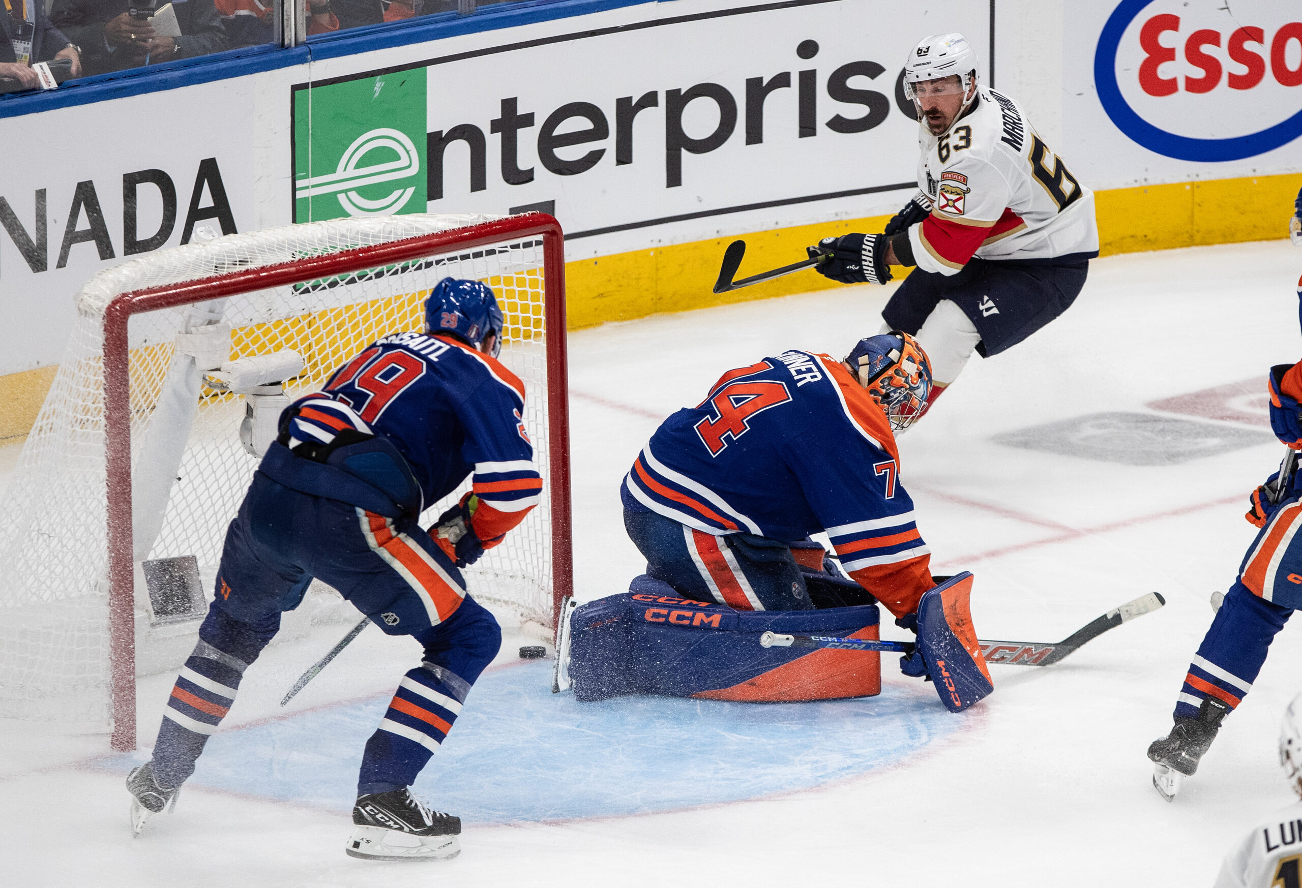 Marchand scores in double OT, Panthers beat Oilers 5-4 to tie series 1-1