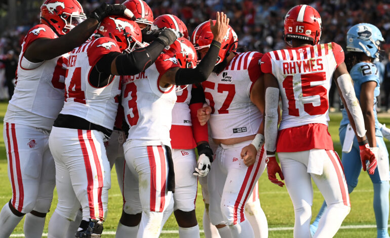 Mill, Adams Jr. score 4th-quarter TDs to lead Stampeders past Argos 29-19