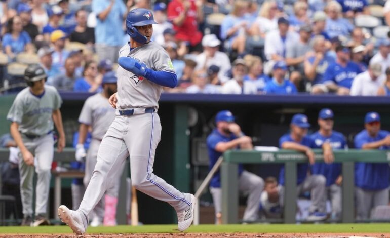Blue Jays clinch playoff spot with win over Royals